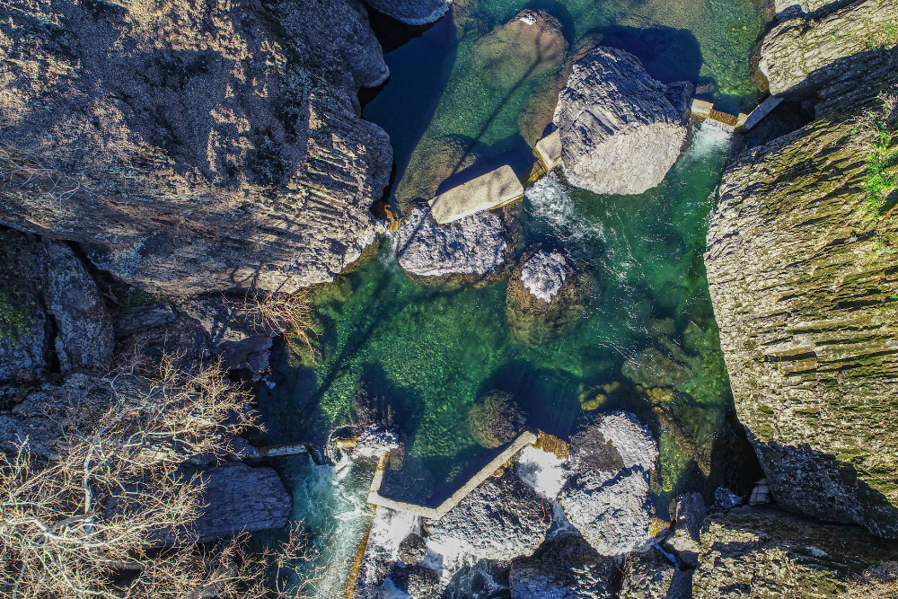 Currently, the fish ladder is unmaintained, damaged by boulders shifted by hydraulic forces, and, as a result, largely impassable to fish.