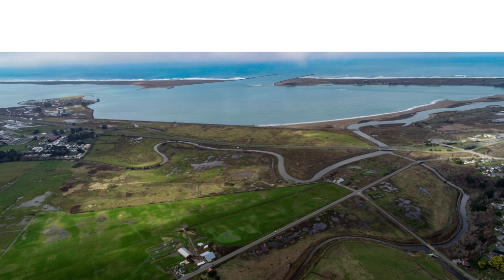 A shot from above of where the Elk River estuary where it meets Humboldt Bay.